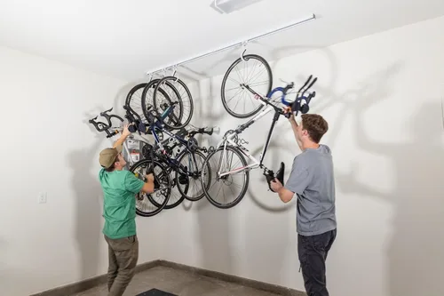 Vista 5 de E-Z Garage Storage Bike Slide Pro - Portabicicletas de techo, capacidad