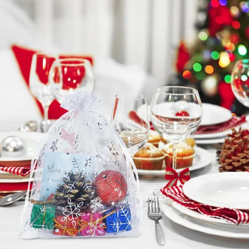 Vista 3 de HRX Package 100 bolsas de organza de copo de nieve de Navidad de 5 x 7 pulgadas, bolsas de regalo de malla con cordón blanco para joyas, dulces