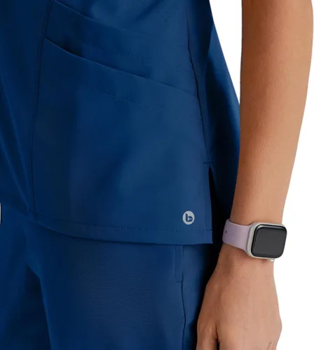 Vista 2 de BARCO ONE - Camiseta médica con cuello en V y 5 bolsillos, elástico de 4 vías, para mujer Índigo (Azul marino)
