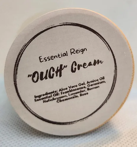Vista 2 de Ouch Cream: contiene aloe vera y aceite de arninca aprox. 2.5 oz de crema por frasco