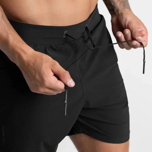Vista 2 de Traje de baño para hombre, pantalones cortos de entrenamiento para hombre, de secado rápido, pantalones cortos activos de 5 pulgadas con bolsillos