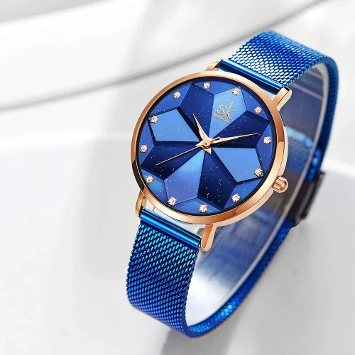 Vista 4 de SK Shengke - Reloj ultra delgado de creativo diseño minimalista, floral o de cielo estrellado con extensibles de piel genuina o acero