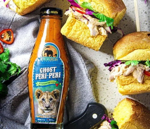 Vista 5 de Ghost Peri-Peri Salsa picante de African Dream Foods Salsa piri-piri picante totalmente natural con pimientos fantasma africanos Vegana, sin