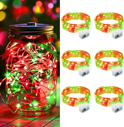 Vista 57 de Paquete de 12 luces LED de hadas AIKEI que funcionan con pilas, cable plateado impermeable de 7 pies, 20 luces LED de luna estrellada de luciérnaga
