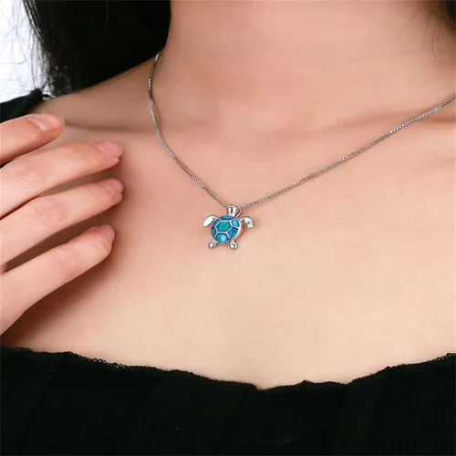 Vista 2 de Juego de collar y aretes de tortuga marina de ópalo para mujeres y niñas, hipoalergénicos, delicados, lindos animales del océano, piedra natal azul