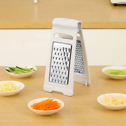 Vista 3 de UPKOCH Rallador de queso de mano, rallador de cocina de acero inoxidable con asa, cortador de frutas de doble cara, triturador manual de verduras