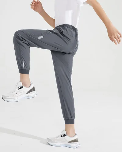 Vista 8 de Pantalones deportivos ligeros para niños y jóvenes, de secado rápido, pantalones deportivos con bolsillos con cremallera