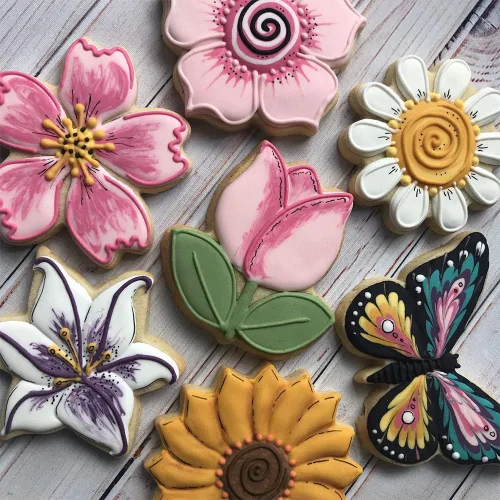 Vista 7 de LILIAO Juego de cortadores de galletas de flores, 7 piezas, diseño de lirio, margarita, girasol, flores de cerezo, tulipán, flores kapok y galletas