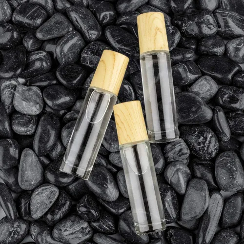 Vista 4 de Tomorotec Paquete de 20 Botellas Rodillo de Aceite Esencial de Vidrio Transparente Ultra Grueso de 10mL con Tapas de Plástico de Grano de Madera