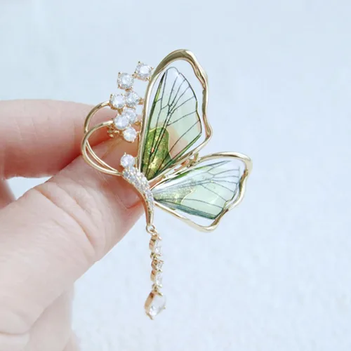 Vista 5 de nuevos broches de mujer, mariposa hada micro incrustado broches de circón, alfileres de ropa de alas de bailarín de alta gama, broches de alas