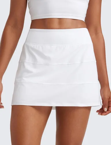 Vista 2 de CRZ YOGA Faldas de tenis de cintura alta para mujer con 3 bolsillos, línea A, ligeras, bonitas, atléticas, casuales, faldas pantalón