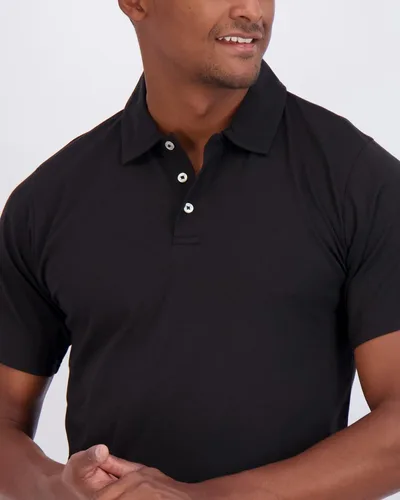 Vista 55 de Real Essentials Paquete de 3: Polo de manga corta de algodón para hombre, de secado rápido, transpirable, (disponible en tallas grandes y altas)