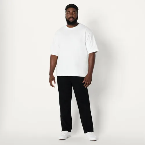 Vista 7 de Amazon Essentials - Pantalones vaqueros de elástico bajo de corte recto para hombre