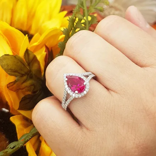 Vista 46 de Dazzlingrock Collection Anillo de compromiso con forma de lágrima y diamante blanco natural redondo de 0.45 quilates con halo de diamantes blancos