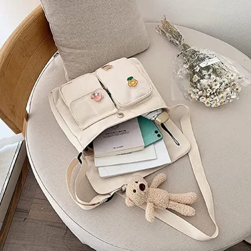 Vista 7 de Bolso cruzado de lona con alfileres Kawaii y colgante bolso de mensajero casual para estudiantes mochila escolar para niñas y mujeres