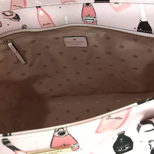 Vista 3 de Kate Spade Pop Fizz - Bolso de mano con estampado de margareta, color rosa