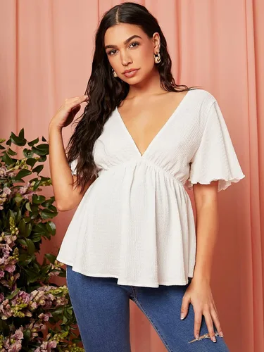 Vista 4 de OYOANGLE Blusa de maternidad con cuello en V profundo, manga corta, dobladillo con volantes, peplum