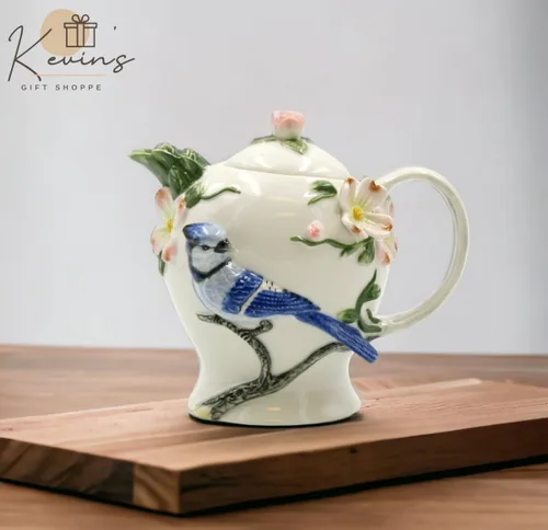 Vista 3 de Tetera de porcelana fina azul Jay Bird con diseño de flores de cornejo, 7 pulgadas de largo