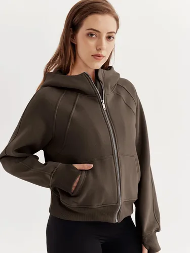 Vista 2 de WYNNQUE Sudaderas cortas con capucha y cremallera para mujer, sudadera con cremallera completa, suéter de invierno con bolsillo