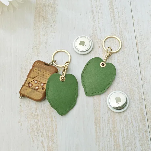Vista 10 de CATCH ON Paquete de 2 fundas de cuero para Airtag para llavero, bonitos accesorios Kawaii adecuados para Airtag