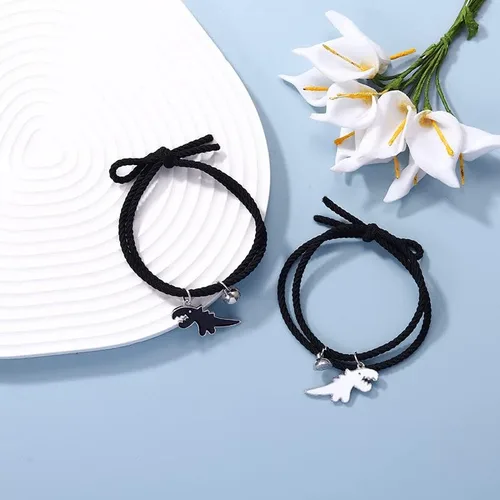 Vista 2 de Juego de 2 pulseras magnéticas de dinosaurio a juego con cuerda trenzada ajustable para mejor amigo, novio, novia, amante, amistad, joyería linda