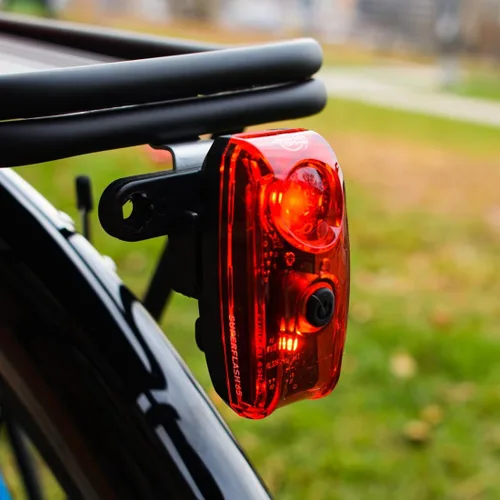 Vista 7 de Planet Bike Superflash 65 - Luz trasera para bicicleta, color rojo y negro