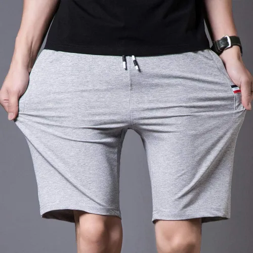 Vista 3 de Pantalones cortos casuales de verano de algodón con cordón de cintura elástica y bolsillos con cremallera