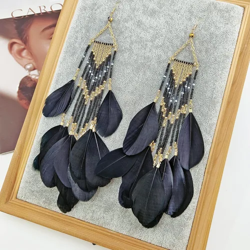 Vista 2 de Aretes de plumas sintéticas para mujer, aretes bohemios con cuentas de semillas con borla de plumas para mujer