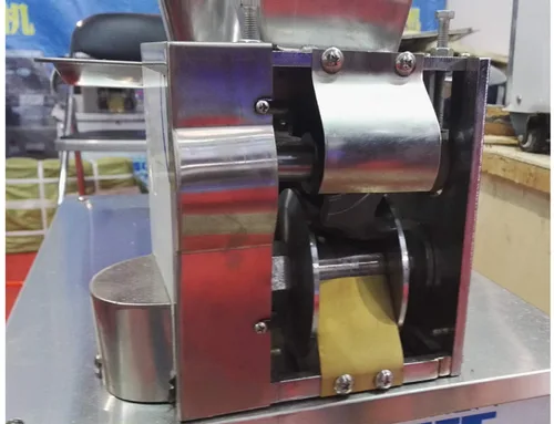 Vista 6 de T. X. Máquina automática de bolas de masa hervida Samosa/empanada/Rollo de resorte/pierogi/Ravioli/Momo máquina del fabricante con 1 molde libre