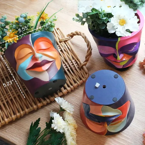 Vista 4 de GUGUGO - Maceta con drenaje y diseño de cara abstracta con colores arcoíris para plantas de interior y exterior, decoración divertida