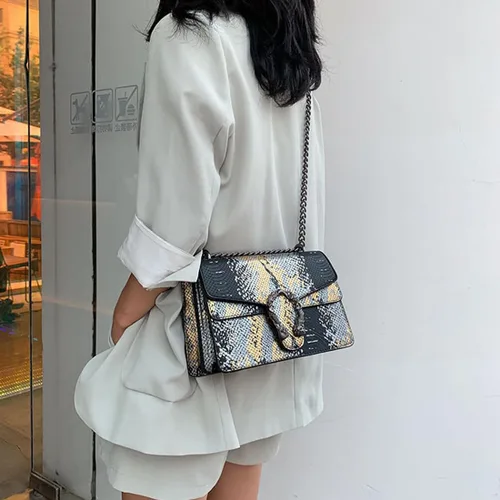 Vista 5 de Bolsos cruzados de cuero de lujo para mujer, con estampado de serpiente, bolso de mano de noche para mujer