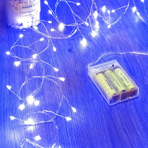 Vista 11 de Luces de hadas que funcionan con pilas, luces de cuerda centelleantes impermeables con cable plateado de 5 pies y 60 LED, luces de fuegos