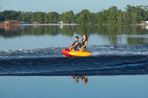 Vista 6 de Airhead Hot Dog Towable Tube for Boating, 1-5 Rider Inflatable Boat Tube for Water Tubing, Full Nylon Cover, EVA Padding, Foam Padded Handles