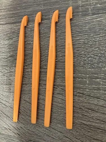 Vista 2 de Juego de 4 peladores de cítricos color naranja