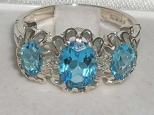 Vista 4 de Anillo de plata de ley 925 con topacio azul auténtico para mujer