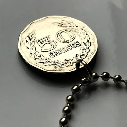 Vista 4 de 1972 Colombia 50 Centavos moneda colgante General Santander Bogotá Medellín Cali Barranquilla Cartagena Cúcuta Soacha Soledad Bucaramanga Bello