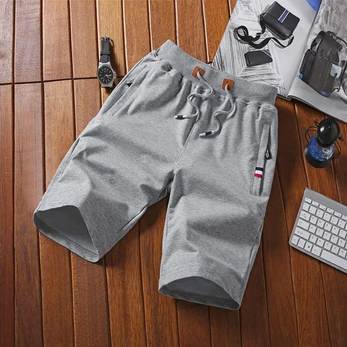 Vista 6 de Pantalones cortos casuales de verano de algodón con cordón de cintura elástica y bolsillos con cremallera