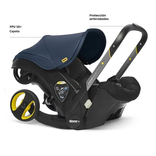 Vista 2 de Doona - Asiento de automóvil y cochecito, Azul profundo - Sistema de viaje todo en uno