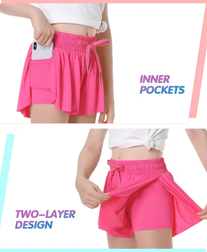 Vista 3 de QooNoo Pantalones cortos de mariposa para niñas con bolsillo, pantalones cortos atléticos fluidos de cintura alta para correr para niños