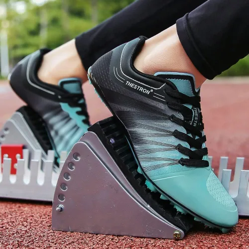 Vista 5 de Zakey Zapatos de pista y campo para hombres y mujeres y niños, zapatillas de deporte de pista de carreras para saltar para niñas, zapatos