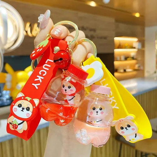 Vista 2 de BEXOA Lindo llavero líquido para regalo de Navidad Dijes de mochila Kawaii Shiba Inu llaveros flotantes para mujer