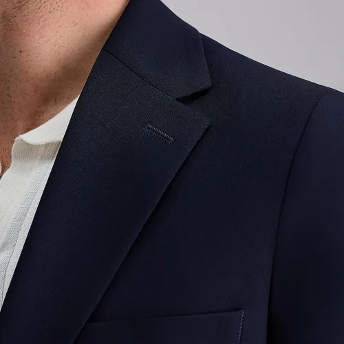 Vista 4 de Haggar Blazer de viaje elástico a medida con ventilación lateral de 2 botones para hombre Medianoche