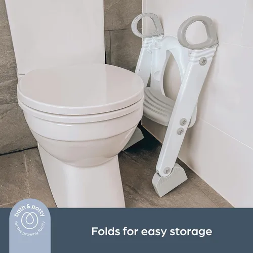 Vista 4 de Dreambaby Asiento de inodoro para niños pequeños con escalones, asiento ajustable para orinal con protector contra salpicaduras, adorno para orinal