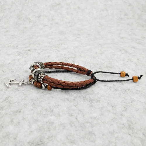 Vista 27 de Suyi brazalete ajustable con varias capas, de cuero tejido trenzado con cruz. Pulsera tipo esclava.