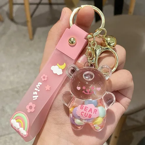 Vista 2 de Llavero Kawaii con diseño de oso líquido flotante de arena movediza, lindo llavero, bolsa, pulsera con dije para mujeres y niñas