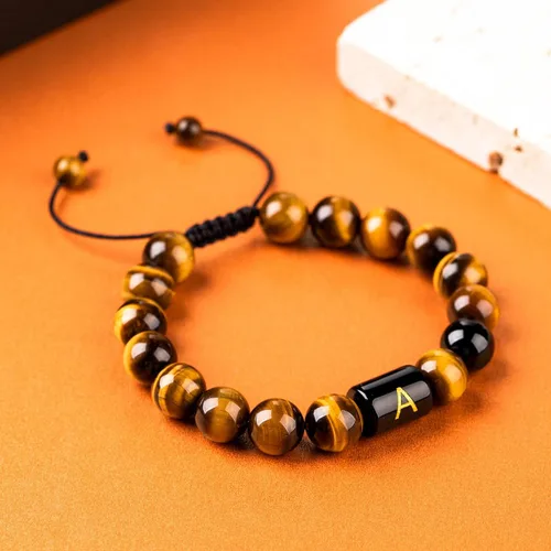 Vista 4 de FRG Brazalete con letra inicial del nombre, hecho a mano, las cuentas son de ónix negro u ojo de tigre, la cuerda es trenzada, un brazalete lleno
