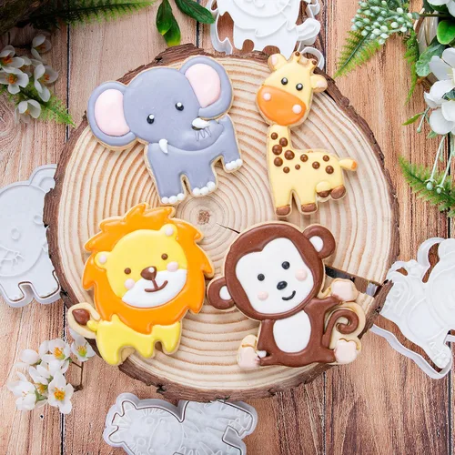 Vista 4 de Juego de 8 cortadores de galletas de animales con mango de sello 3D, diseño de selva para cocina, formas de pastel de ácido poliláctico