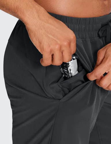 Vista 3 de CRZ YOGA Pantalones cortos de correr 2 en 1 para hombre con forro 5, 7 y 9 pulgadas, de secado rápido, pantalones cortos deportivos con bolsillos