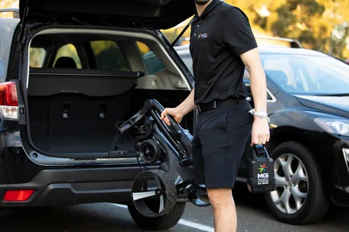 Vista 7 de MGI Zip Navigator Electric Golf Cart - 36 Hole Battery - Remote Control - (Drink, Umbrella, & GPS Phone)