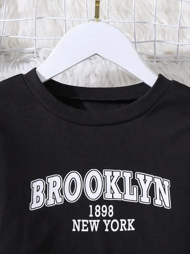 Vista 3 de WDIRARA Conjunto de 2 piezas para niña con camiseta de manga corta y pantalones cargo con bolsillo